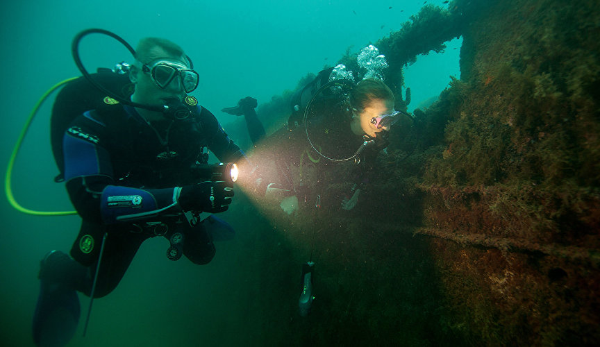 Diving to a sunk military torpedo boat near Meganom Cape, Black Sea