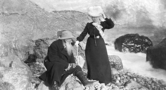 Leo Tolstoy and his wife on the beach